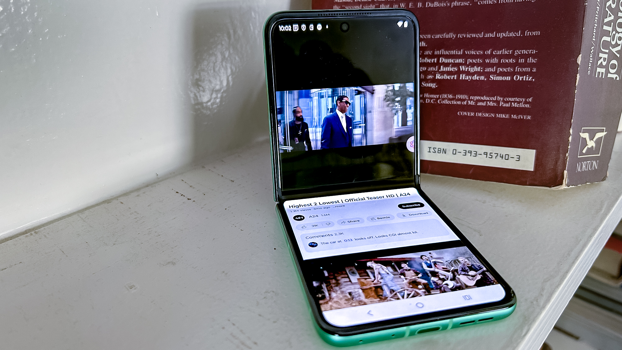 youtube video playing on motorola razr screen with the device in flex mode