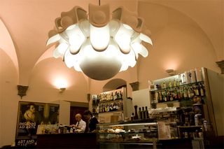 The interior of the Caffé Giacosa featuring Markus Bader’s lighting installation, ’Venti Volte’