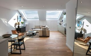 The loft apartments make use of the sloped ceilings, with large windows providing fantastic lighting