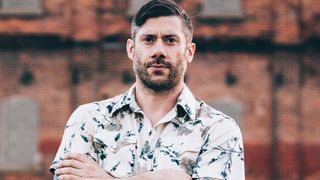 Wes Borland in a 1970s patterned white shirt