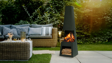 patio with sofa and fireplace