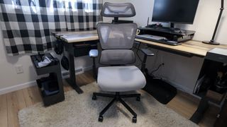 The ProtoArc EC100 office chair in front of a desk