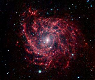 Spiral Galaxy Glows Like A Cosmic Spider Web Space