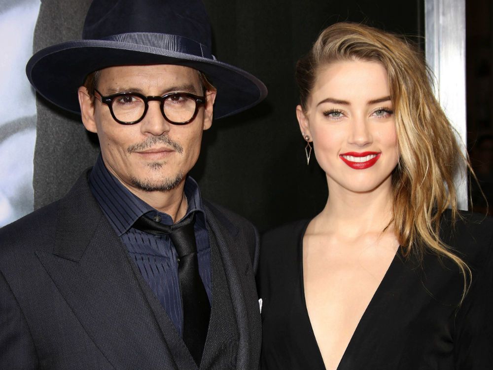 Johnny Depp and Amber Heard at the 3 Days to Kill premiere