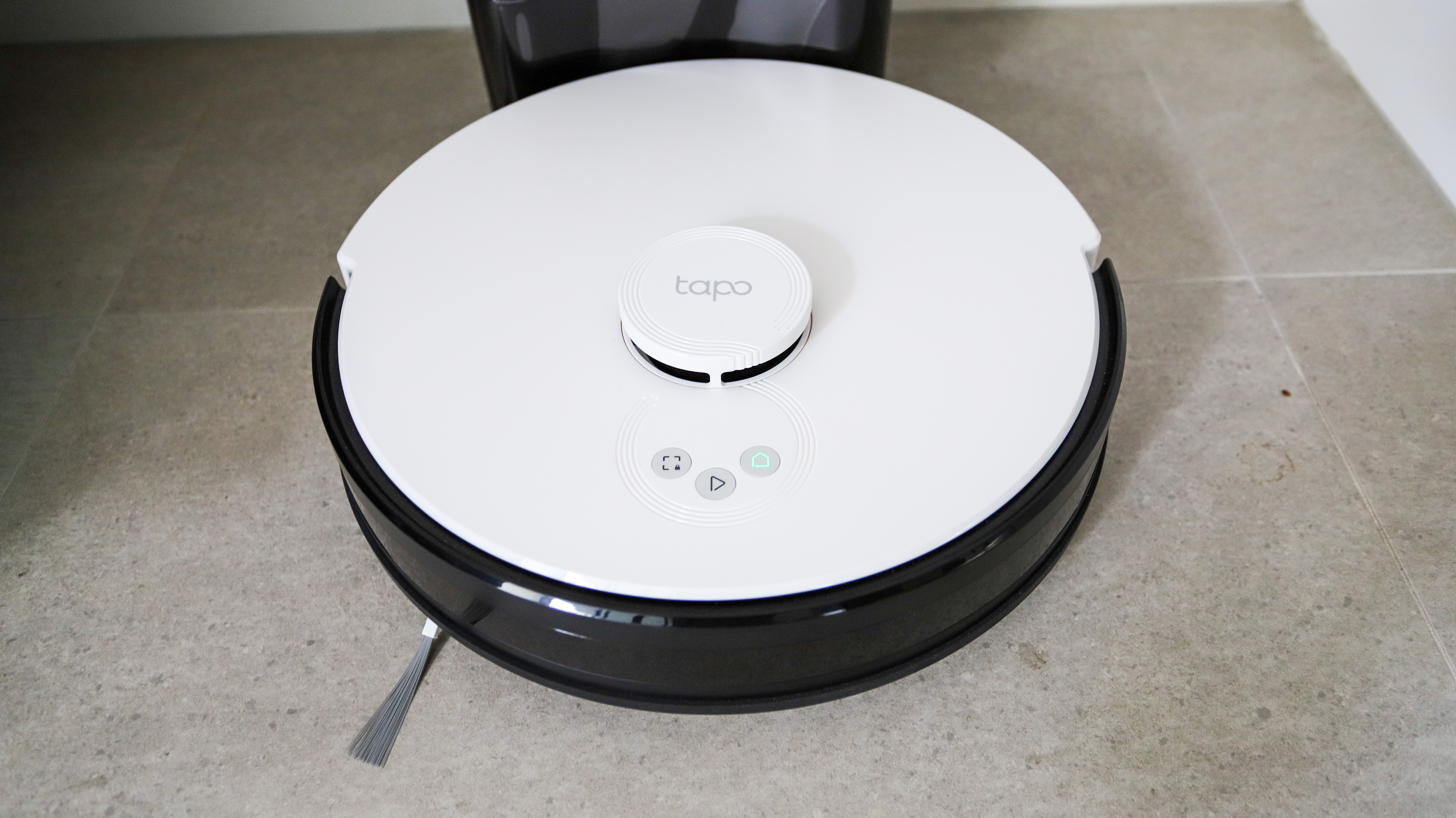 TP-Link Tapo RV30 Plus robot vacuum cleaner in its auto-empty dock