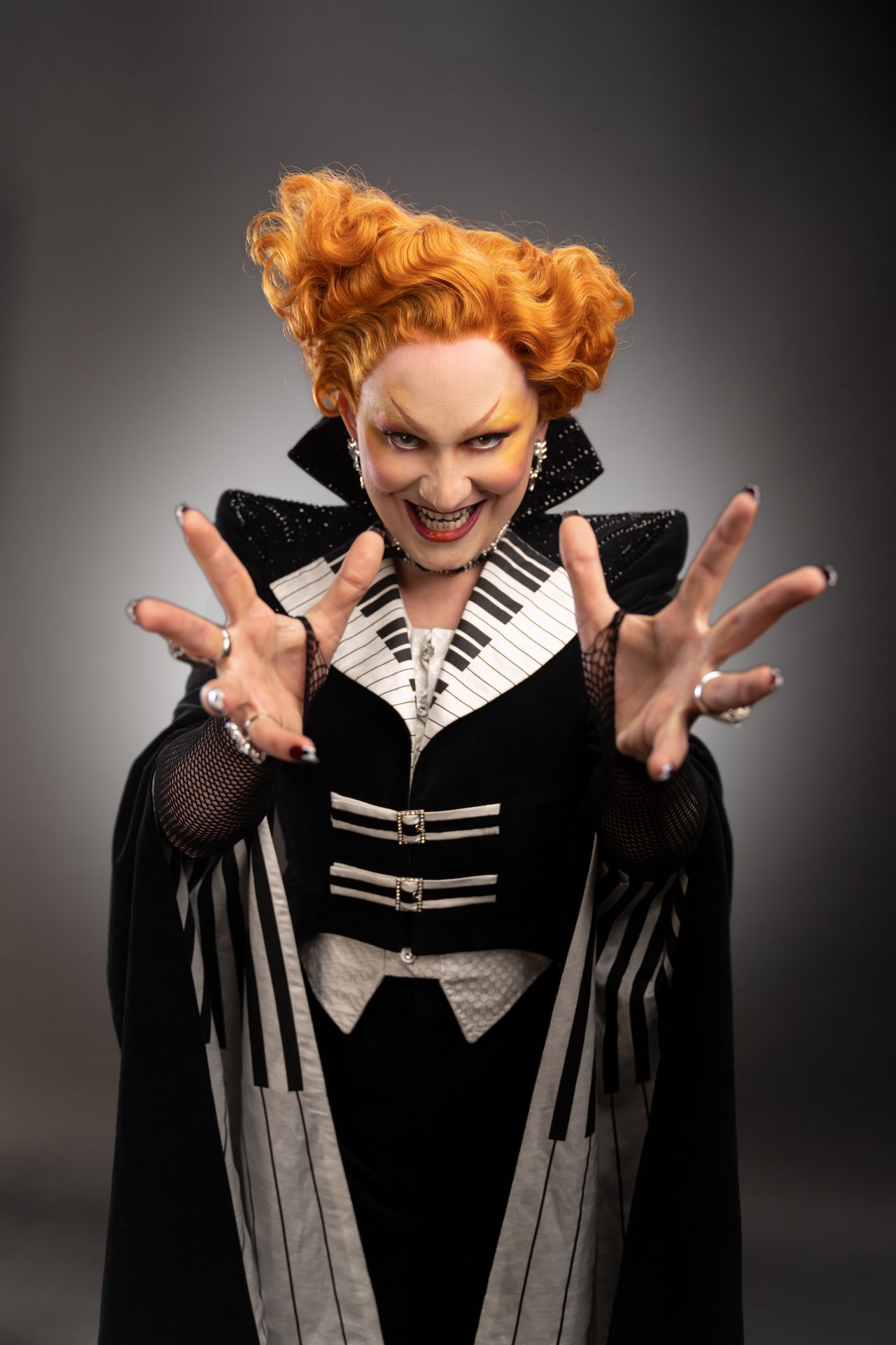 Jinkx Monsoon in Doctor Who reaching towards the camera