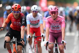 FOSSANO ITALY MAY 06 LR Geraint Thomas of The United Kingdom and Team INEOS Grenadiers and Tadej Pogacar of Slovenia and UAE Team Emirates Pink Leader Jersey cross the finish line during the 107th Giro dItalia 2024 Stage 3 a 166km stage from Novara to Fossano 374m UCIWT on May 06 2024 in Fossano Italy Photo by Dario BelingheriGetty Images