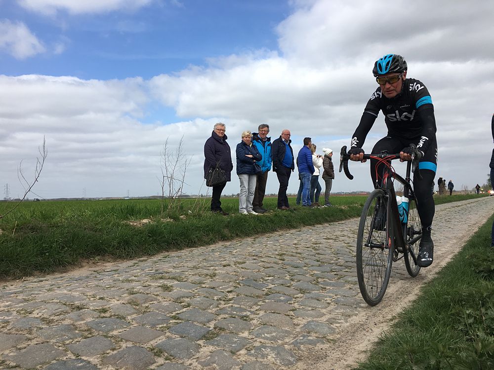 A Team Sky fan tries out the cobbles