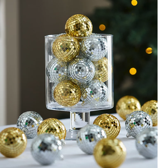 Mirrorball baubles in glass vase