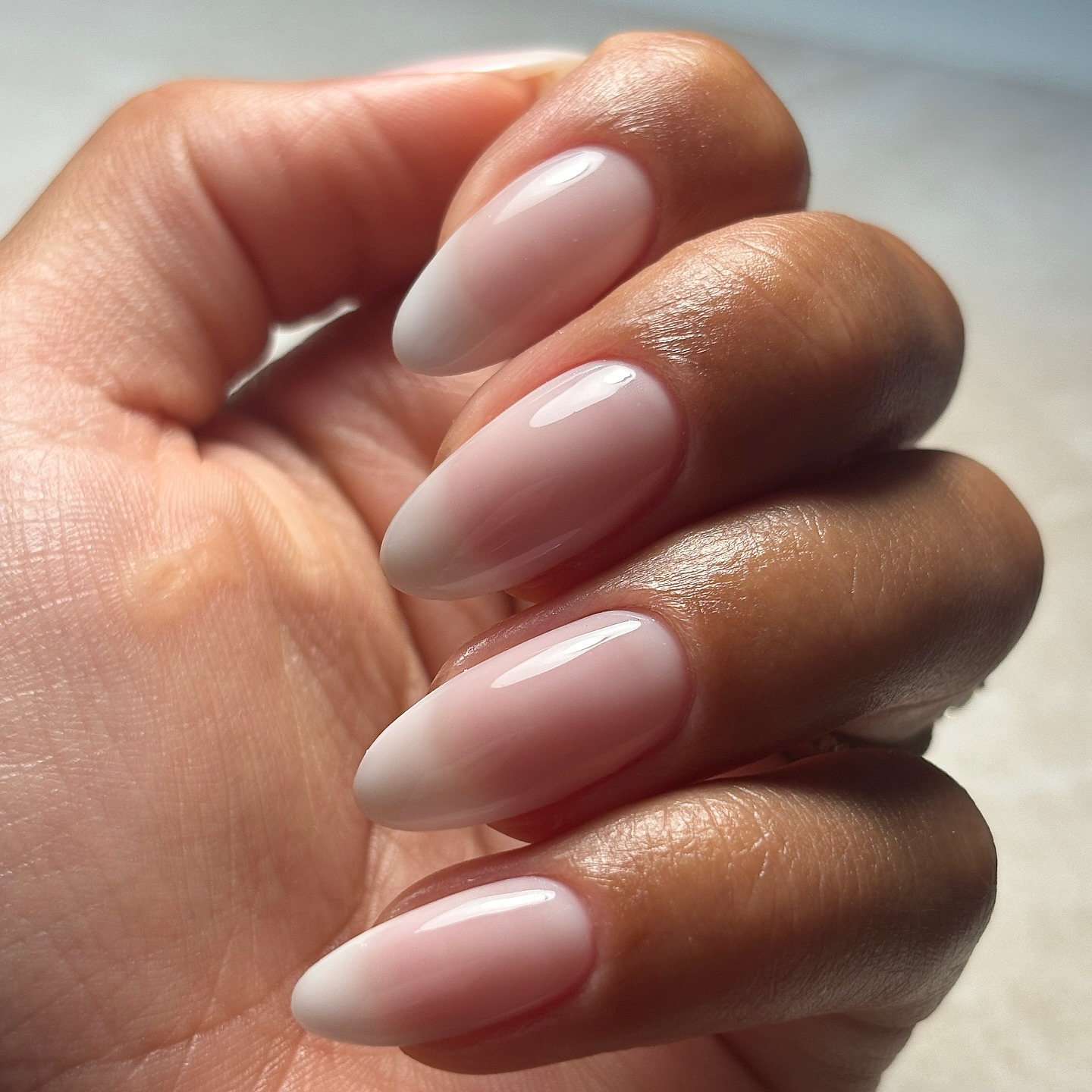 Milky French nails.