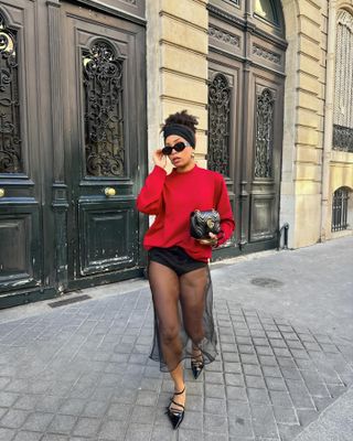 Ellie Nes wearing a sheer skirt in Paris