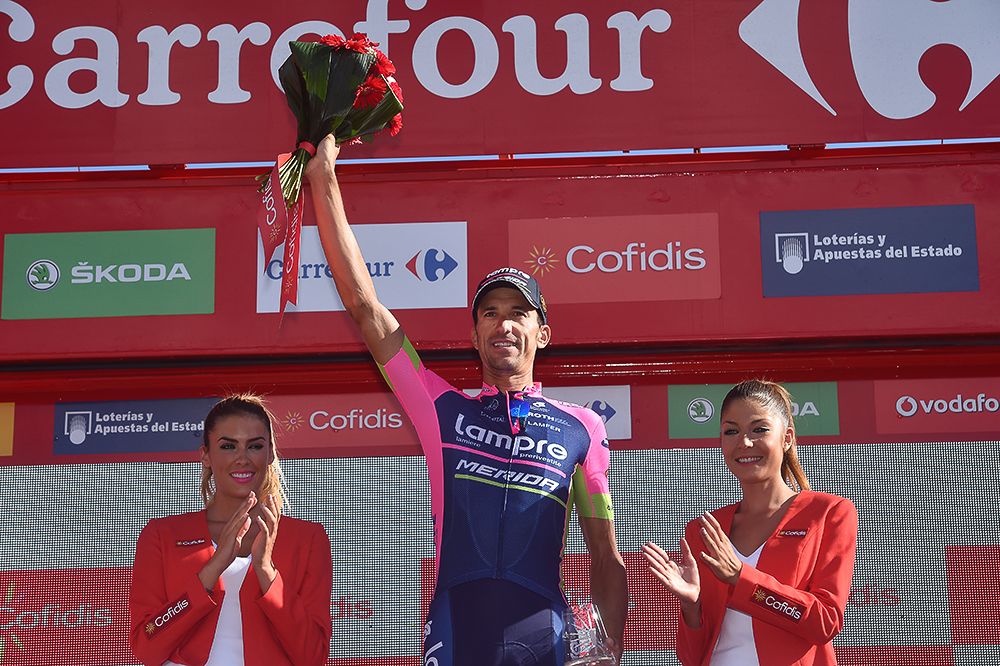 Ruben Plaza celebrates on the stage 20 podium.