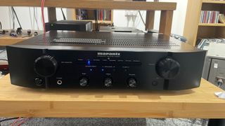 Marantz PM6007 in black finish on wooden rack