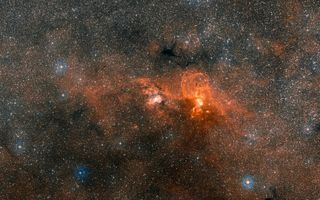 This wide view shows the region around the star cluster NGC 3603, located about 20,000 light-years from Earth.