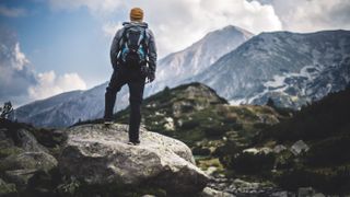 best daypacks: hiker wearing a daypack