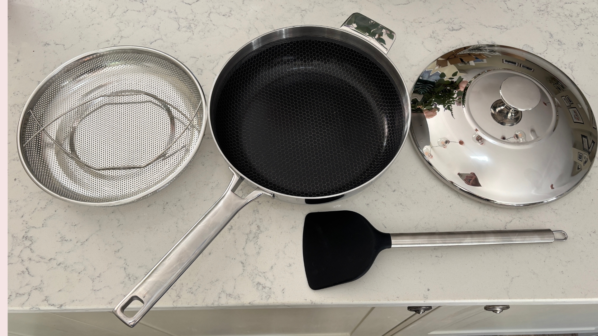 Testing the Lakeland 10-in-1 Only Pan Pro showing the parts on the counter