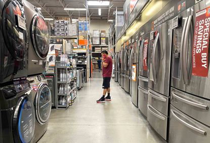  person shops in a Home Depot store on September 13, 2022 in Huntington Park, California.