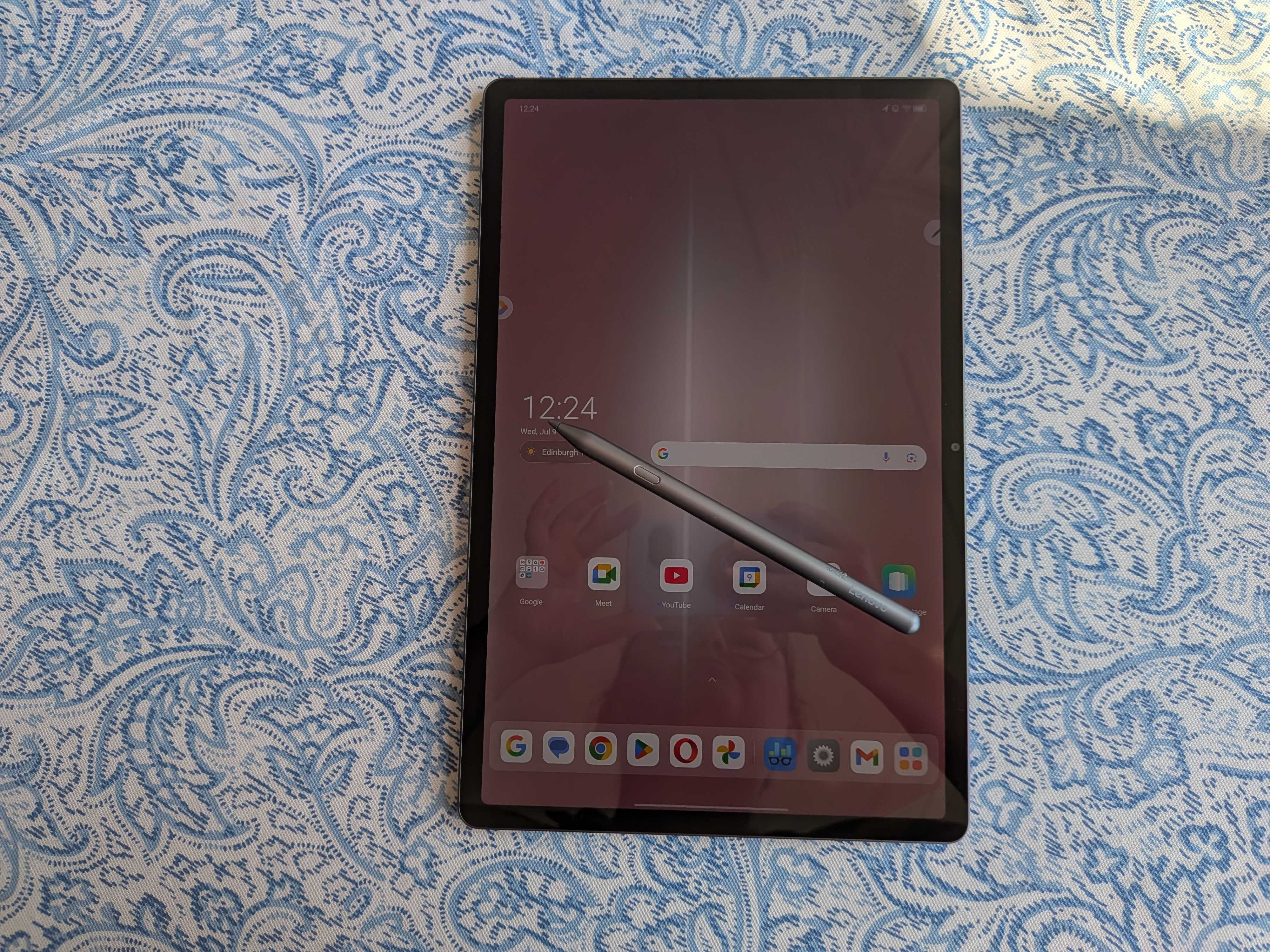 A Lenovo Idea Tab Pro tablet on a blue and white table