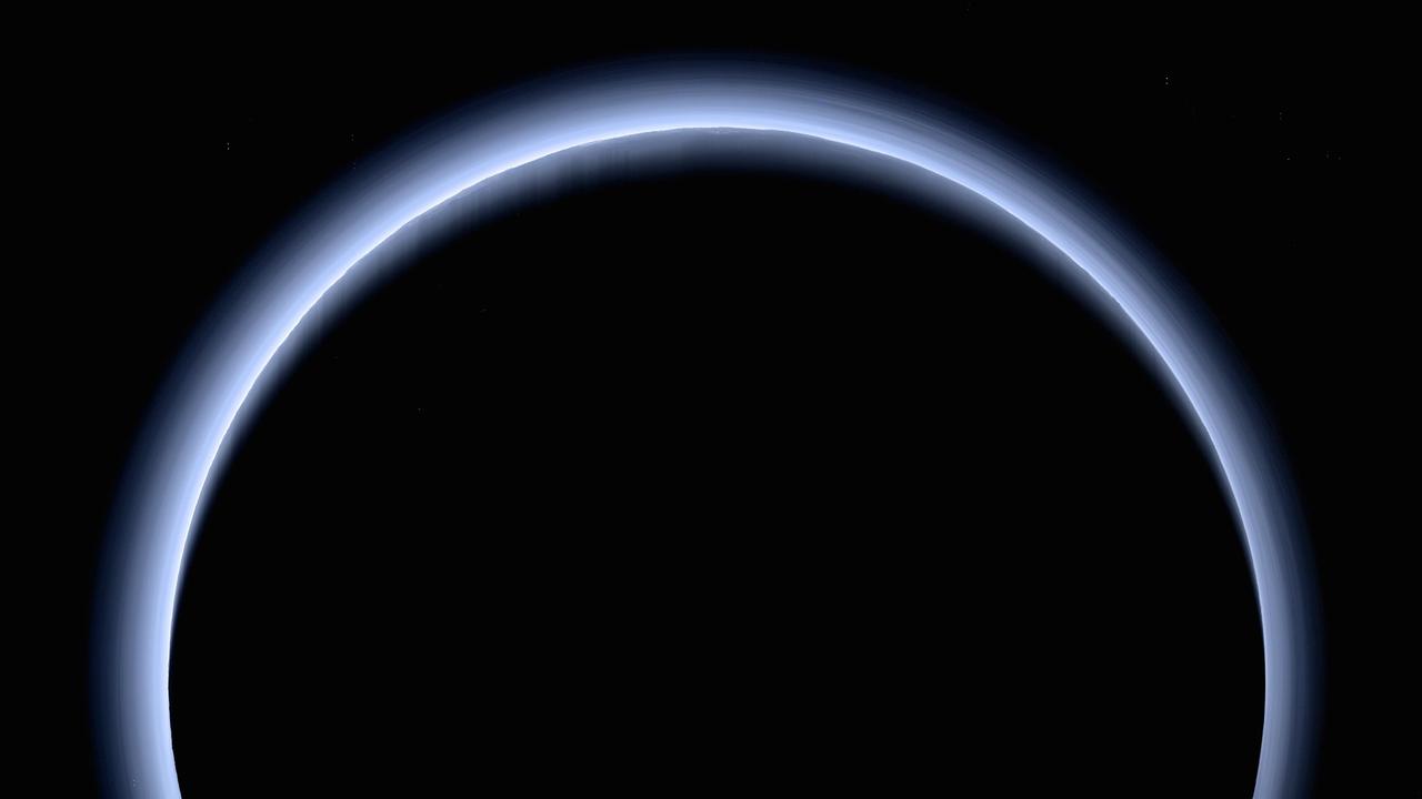 NASA’s New Horizons spacecraft captured this image of Pluto when it was 120,000 miles (200,000 kilometers) away from the dwarf planet. Pluto’s atmosphere can be seen as a blue haze.