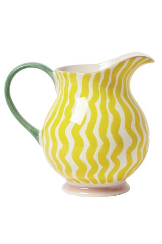 yellow wave pattern striped jug with blue handle