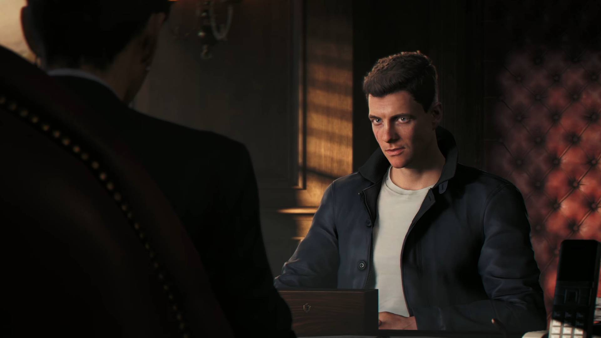 007 First Light James Bond sitting in office talking to M