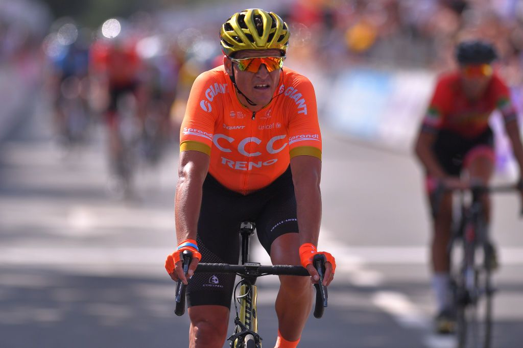 Greg Van Avermaet crosses the line