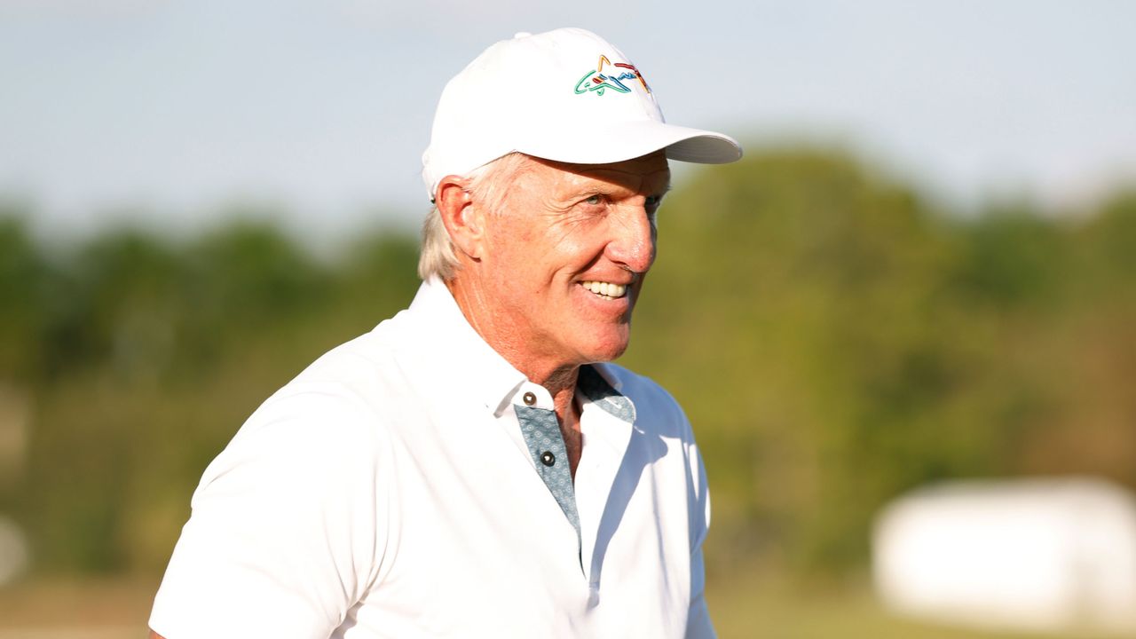 Greg Norman smiles