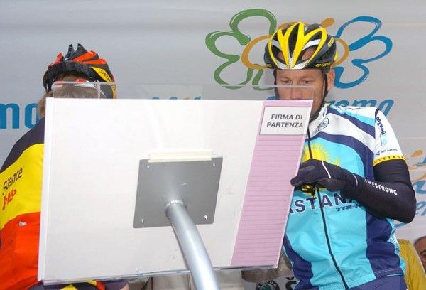 Sign in: Lance Armstrong (Astana) signs in for the 100th edition of the Milano-Sanremo.
