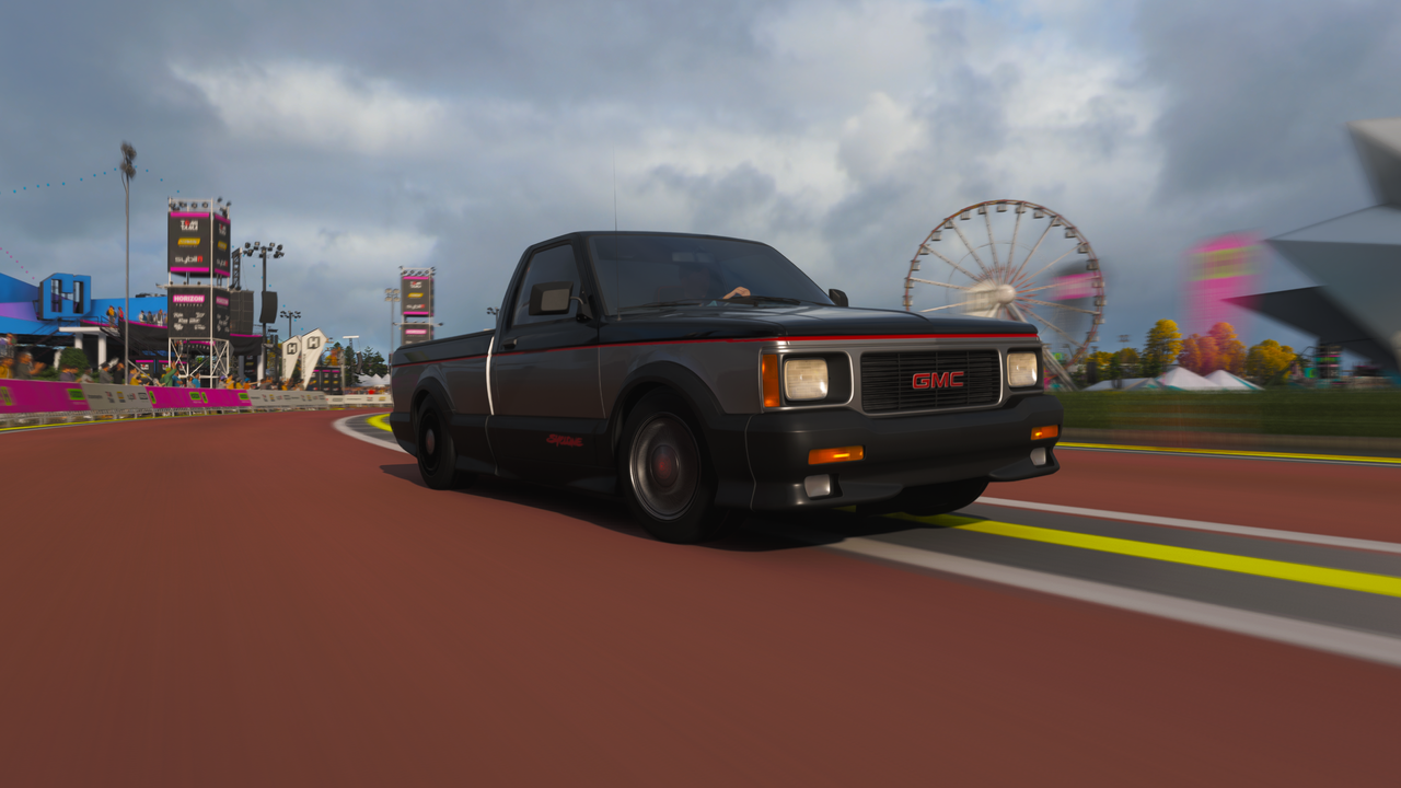 Forza Horizon 6 best cars: A classic-looking GMC Syclone racing through the Horizon Festival.