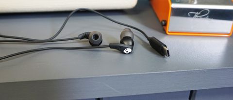 Skullcandy Set USB-C earbuds on grey surface 