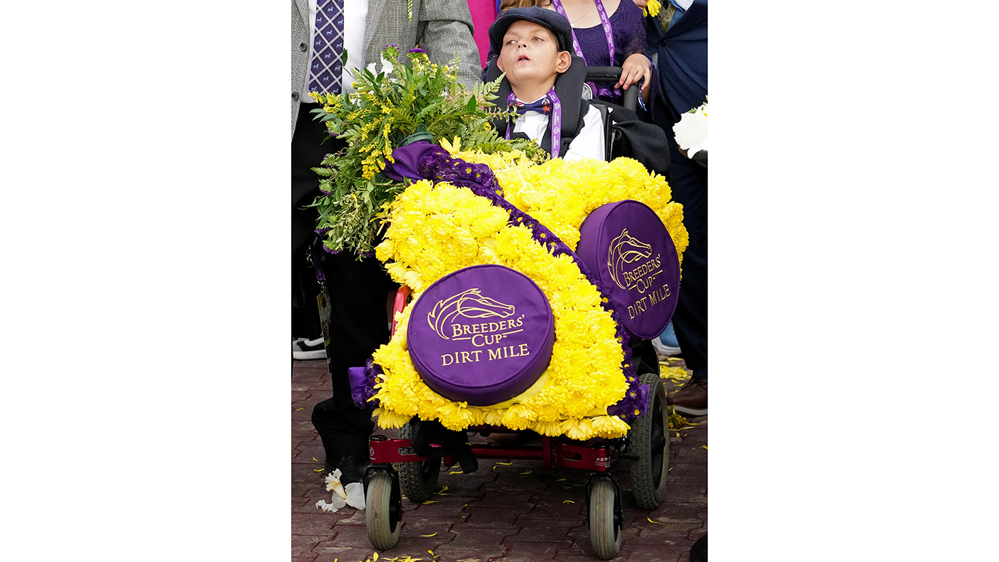 Cody holding the winner&amp;rsquo;s wreath after Cody&amp;rsquo;s Wish won the Breeders&amp;rsquo; Cup Dirt Mile