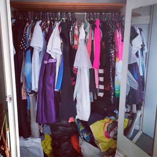 wardrobe with full of clothes