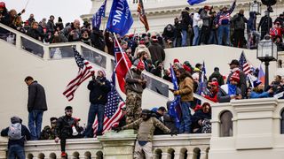 Pro-Trump supporters storm the U.S. Capitol following a rally with President Donald Trump on January 6, 2021 in Washington, DC. Trump supporters gathered in the nation's capital today to protest the ratification of President-elect Joe Biden's Electoral College victory over President Trump in the 2020 election.