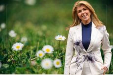 An image of Kate Garraway against a backdrop of daisies and weeds