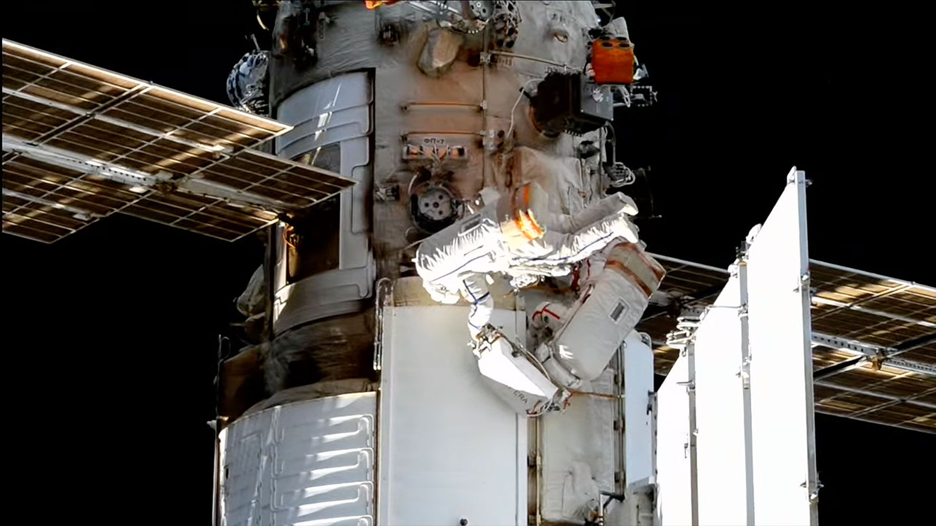 Spacewalking Russian cosmonauts set up experiments on the Worldwide House Station