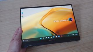 Asus Zenbook 14x on desk in tablet mode