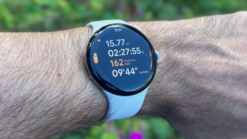 Close-up of the Google Pixel Watch 4 showing the current mileage, duration, HR, zone, and pace for a run activity.