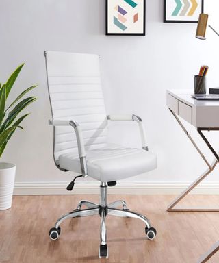 A white leather office chair in a home office