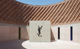 Circular courtyard at the centre of the building, featuring spiral brickwork and the Yves Saint Laurent logo