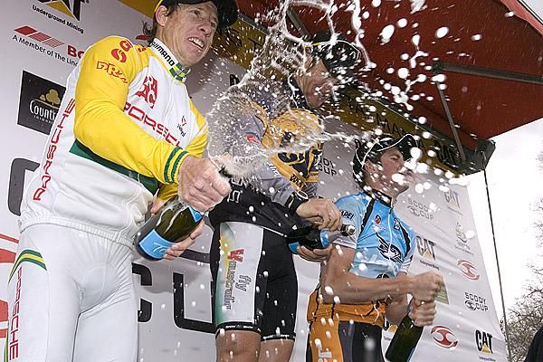 The Tour's top three (l-r): Peter McDonald (2nd,Drapac Porsche), Bernard Sulzberger (1st,Fly V Australia), and Luke Durbridge (3rd,Jayco/AIS) get ready to party on the podium in Westbury.