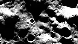 black and white image of moon close up