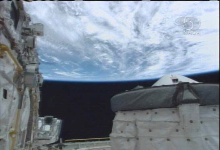 Astronauts Inspect Shuttle Heat Shield for Dings