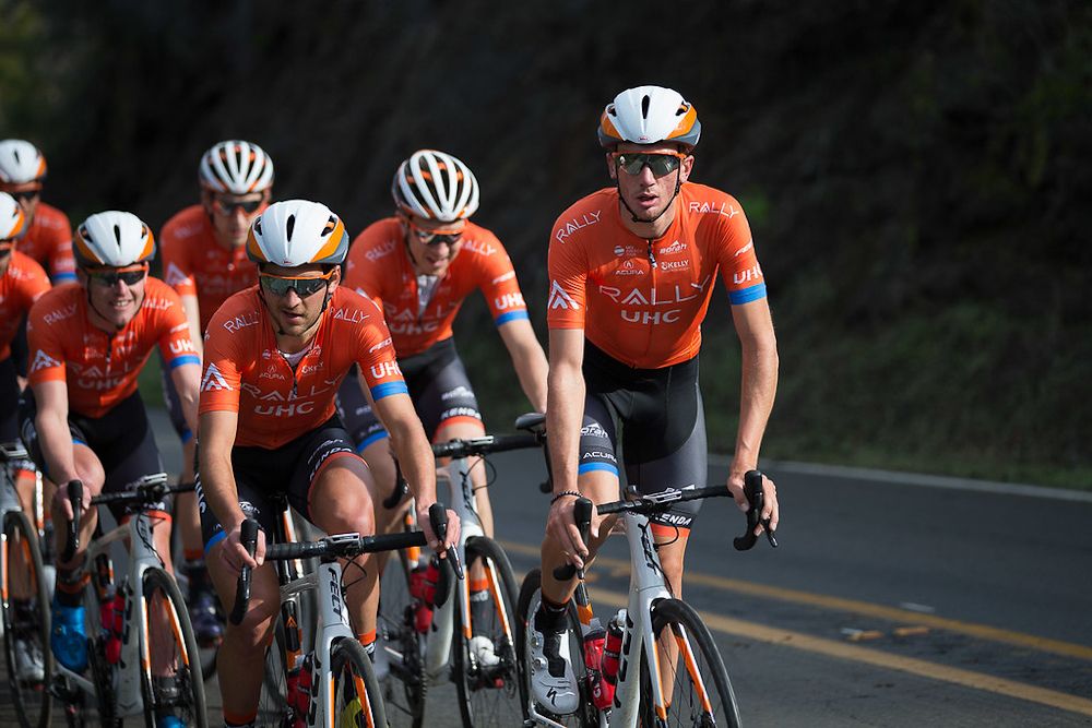 Emerson Oronte and Brandon McNulty lead the bunch during a training ride