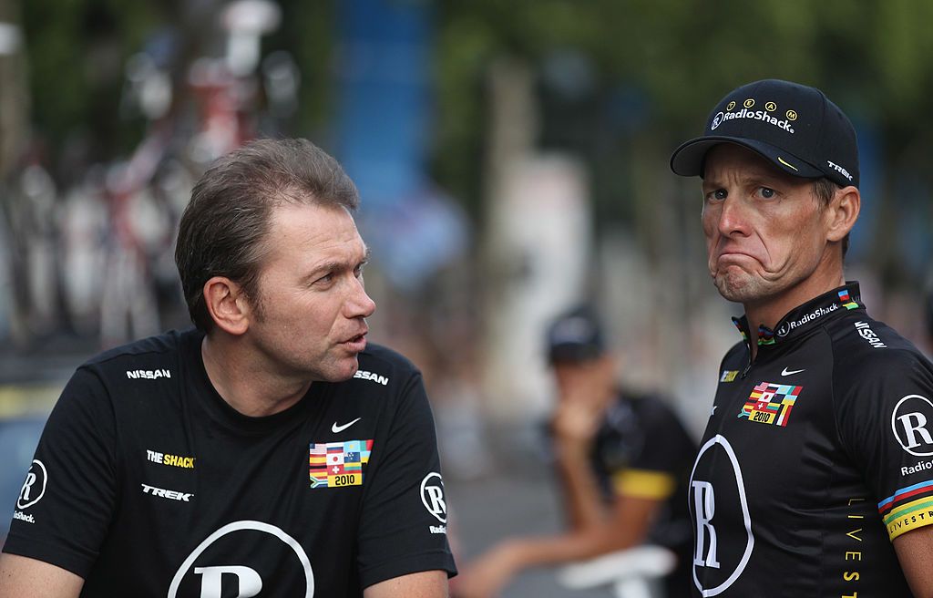 Johan Bruyneel and Lance Armstrong after the 2010 Tour de France