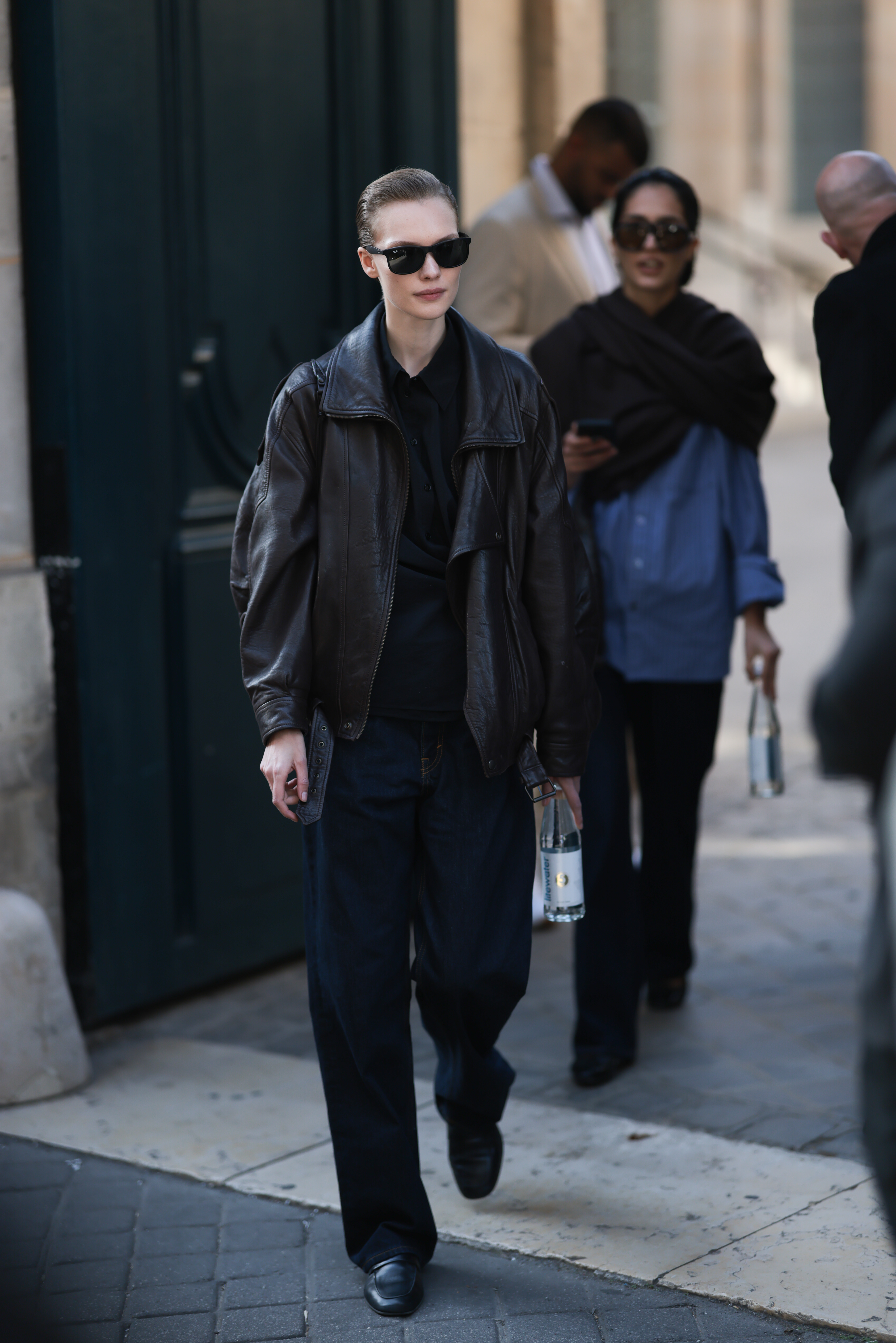 A woman wears a chic outfit to The Row show in paris.