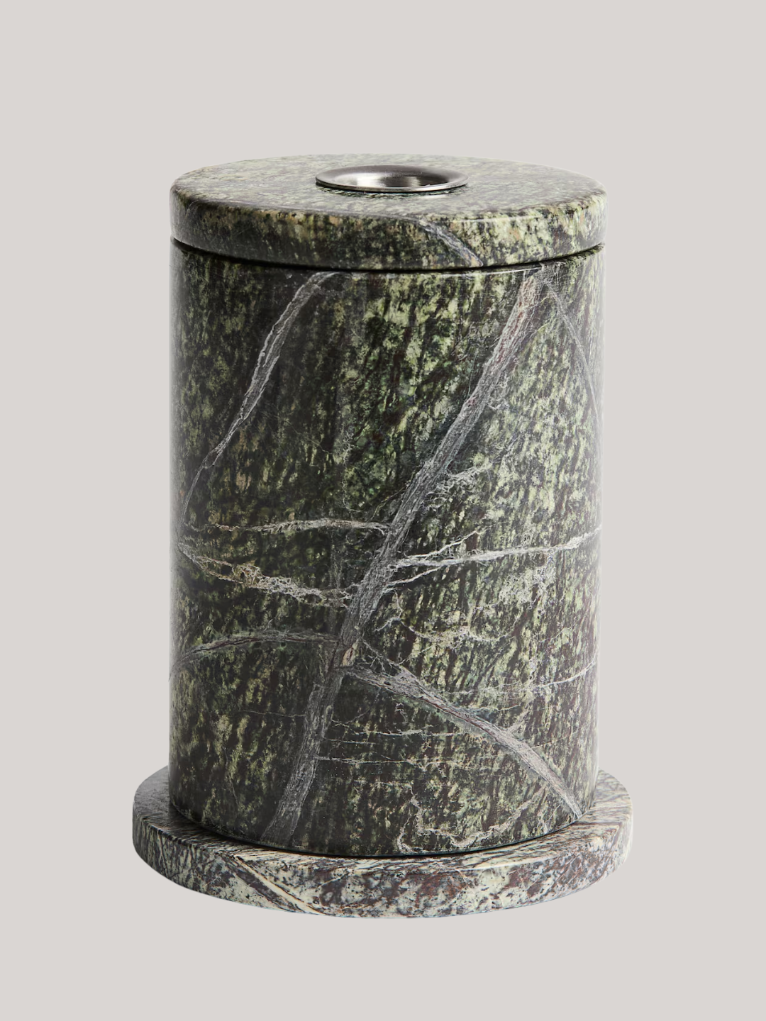A dark green marbled reed diffuser container from H&amp;amp;M