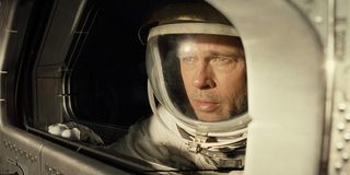Ad Astra Brad Pitt looks out the spaceship window