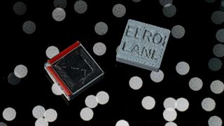 Signals from extremely low resource optical identifier (ELROI) tiles could help reduce the risk of crashes between drifting bits of space trash.