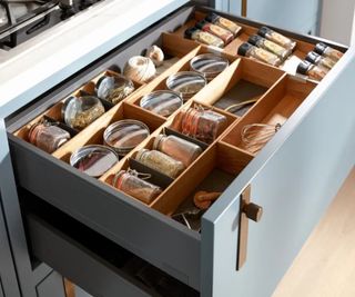 Plastic containers in kitchen drawers