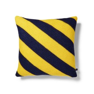 throw pillow in yellow and navy stripes